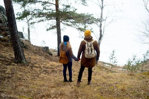 Couple hiking in forest Stock Photos