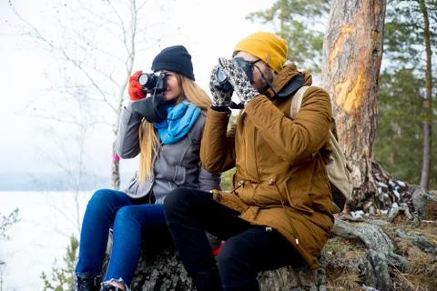 Couple hiking in forest Stock Photos
