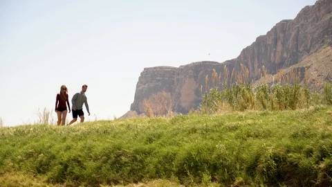 Couple Hiking Mountain Range Video stock 97127564