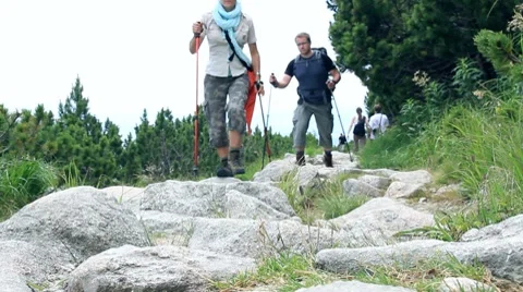 Couple hiking in the mountains Stock Footage 7902082