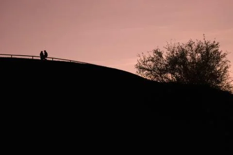 Couple on a hill Stock Photos
