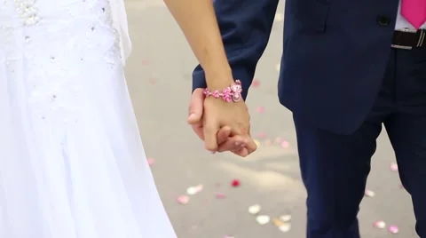 The couple hold hands Stock Footage 45833535