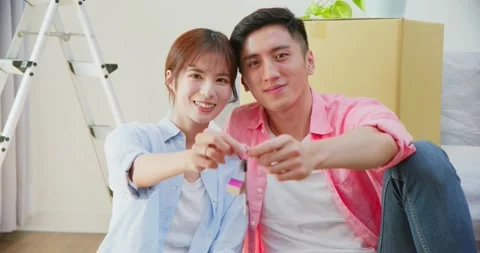 Couple hold keys Stock Footage 162144588