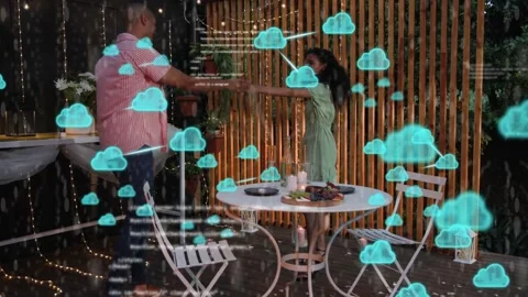 Couple holding on deck, clapping, starting cyan cloud tech overlay spreading Stock Footage 333485857