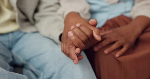 Couple, holding hands and bonding with partner, loyalty and commitment for Stock Footage 337541541