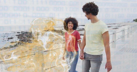 Couple holding hands on beach with abstract golden animation overlay Stock Footage 305262064