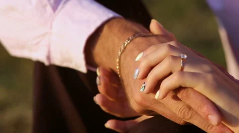 A couple holding hands Stock Footage 67963022