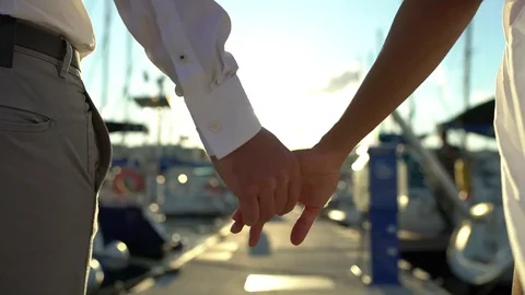 Couple holding hands Stock Footage 81043601