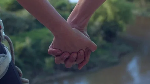 Couple Holding hands in the forest close up 스톡 동영상 75167498