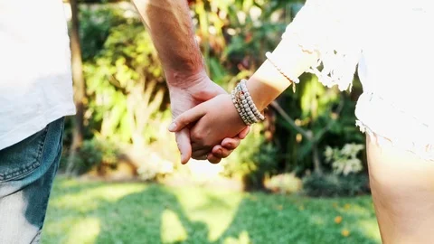 Couple holding hands in park. Stock Footage 101894141
