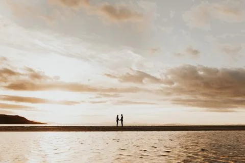 Couple holding hands Stock Photos