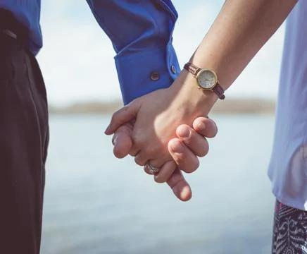 Couple Holding Hands Stock Photos