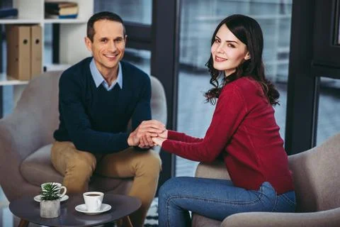 Couple holding hands Stock Photos