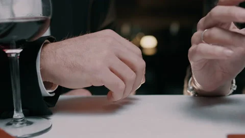 Couple holding hands at a table in a restaurant Video stock 131249126