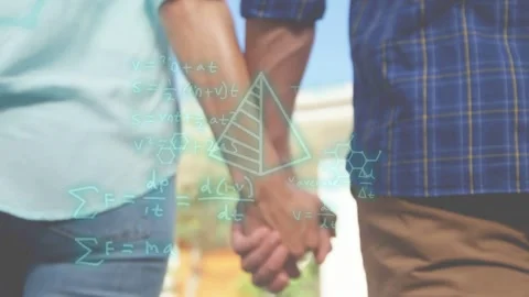 Couple holding hands walking, camera pulling back causing math overlays over Stock Footage 333193111