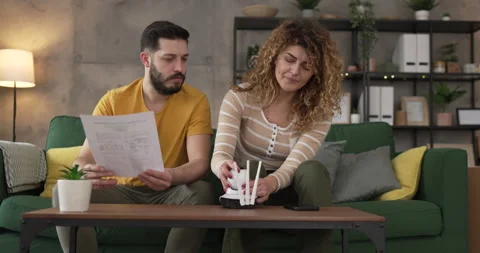 Couple at home connect and install cctv security surveillance camera Stock Footage 264782116