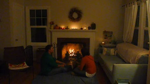 Couple at Home at Fireplace Time Lapse Stock Footage
