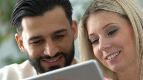 Couple at home using a tablet Stock Footage 101073284