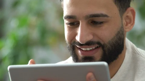 Couple at home using a tablet Stock Footage 101073578