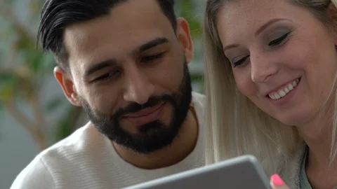 Couple at home using a tablet Stock Footage 101074031