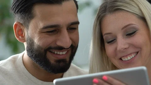 Couple at home using a tablet Stock Footage 101075267