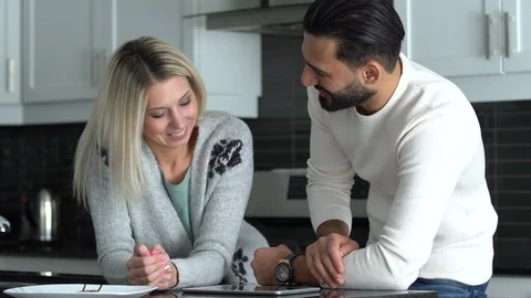 Couple at home using a tablet Stock Footage 101075310