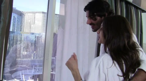 Couple at hotel window V2 - HD Stock Footage 996045