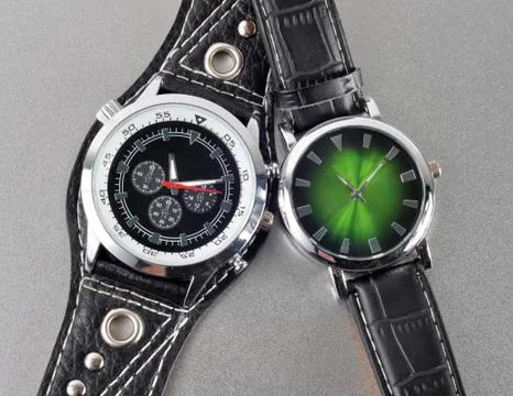 Couple of hours on a silver background Stock Photos