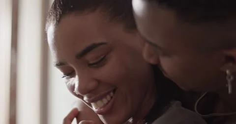 Couple hugging and talking during lunch preparation Stock Footage 181712918