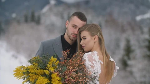 Couple hugging on the background of the winter forest Video stock 141676991