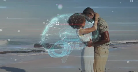 Couple hugging on beach at sunset, 3D brain emerging and pulsing showing 動画素材 313093872