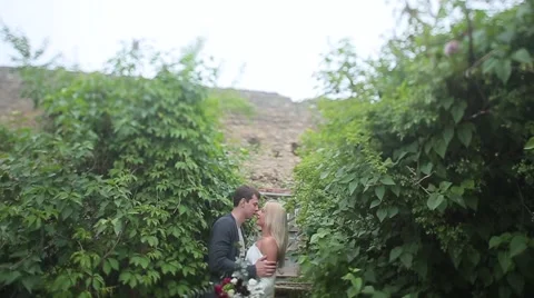Couple hugging in the garden Stock Footage 64775542