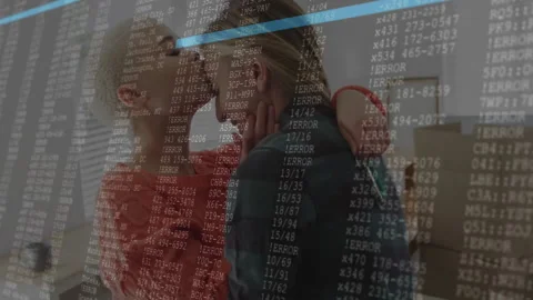 Couple hugging near boxes during move, activating scrolling technology code Stock Footage 310153776