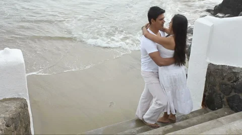 Couple hugging by the ocean Stock Footage 1092247