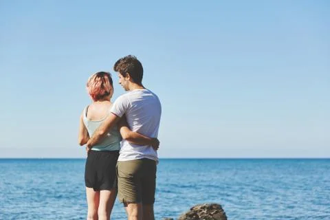 Couple hugging at seaside Stock Photos