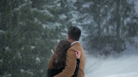 Couple Hugging in the Snow 2 Video stock 89114771