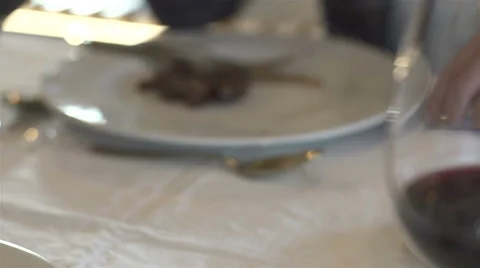 A couple on an intimate dinner. He asks her to marry him and offers you a ring. Stock Footage 63868158
