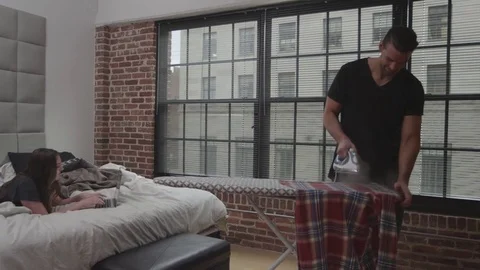 Couple Ironing Clothes Stock Footage 70807931