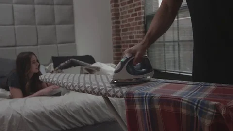 Couple Ironing Clothes Stock Footage 70807991