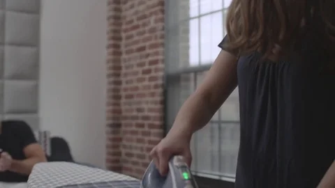 Couple Ironing Clothes Stock Footage 70808097