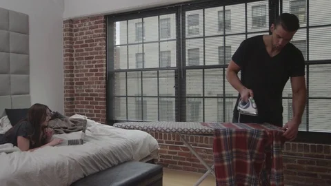 Couple Ironing Clothes Stock Footage 70808152
