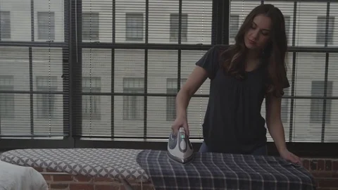 Couple Ironing Clothes Stock Footage 70808238