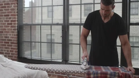 Couple Ironing Clothes Stock Footage 70808351