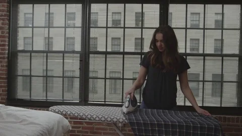 Couple Ironing Clothes Stock Footage 70808433