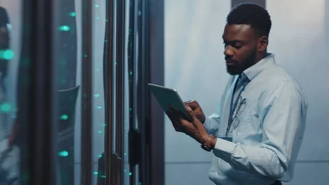 Couple of IT server engineers working in cyber security center. Diverse data 스톡 동영상 119082793