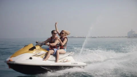 Couple on jet ski. Stock Footage 119395406