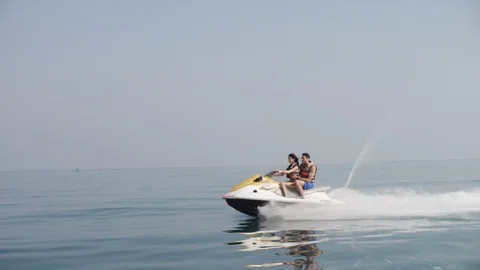 Couple on jet ski. Stock Footage 119395667
