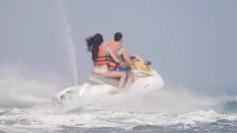 Couple on jet ski. Stock Footage 119396192