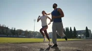 Couple Of Joggers In Stadium Stock Footage