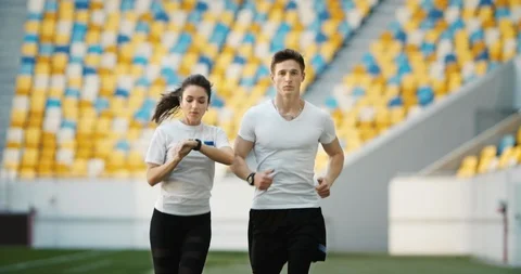 Couple of Joggers on Stadium 動画素材 112434707